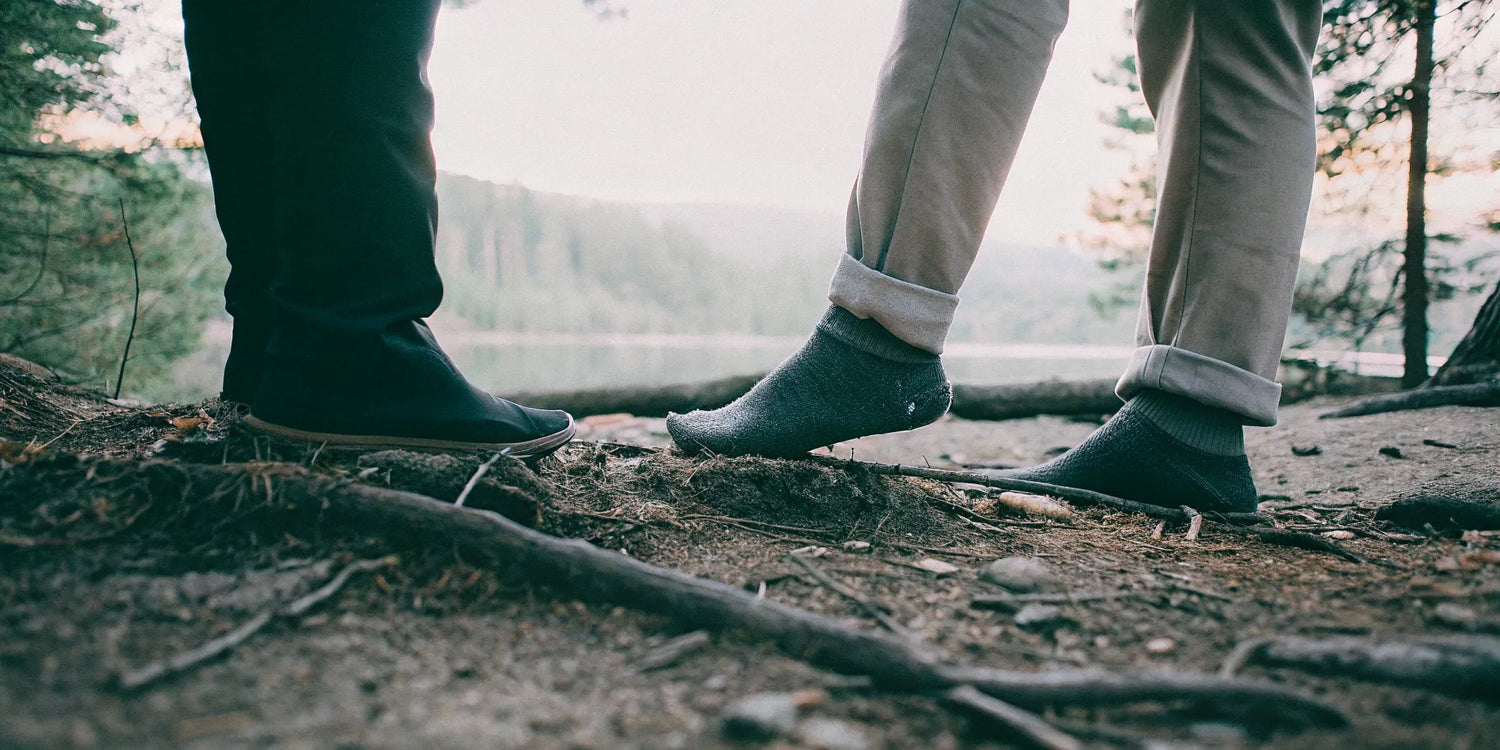 Grounding socks worn with conductive footwear outdoors