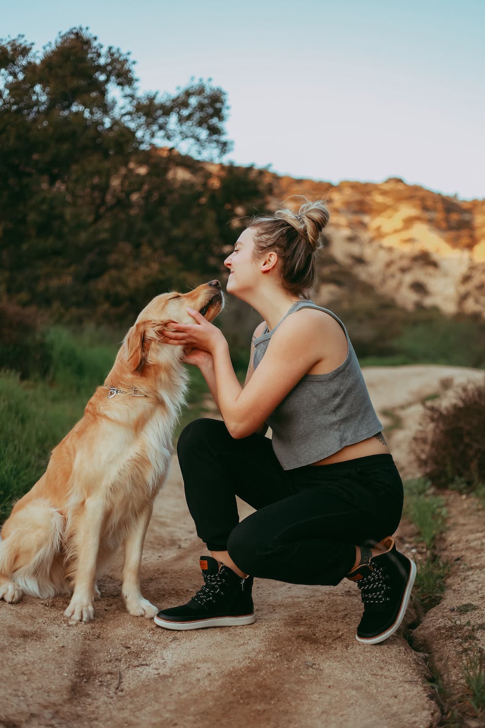 girl in grounding shoes for walking with her dog