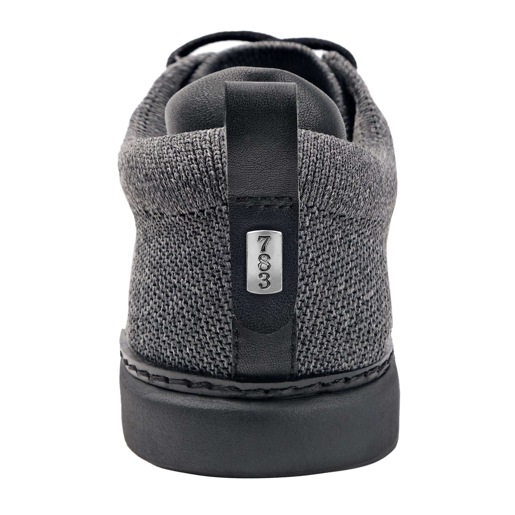 heel view of emerson knit grounded walker in charcoal with black accents