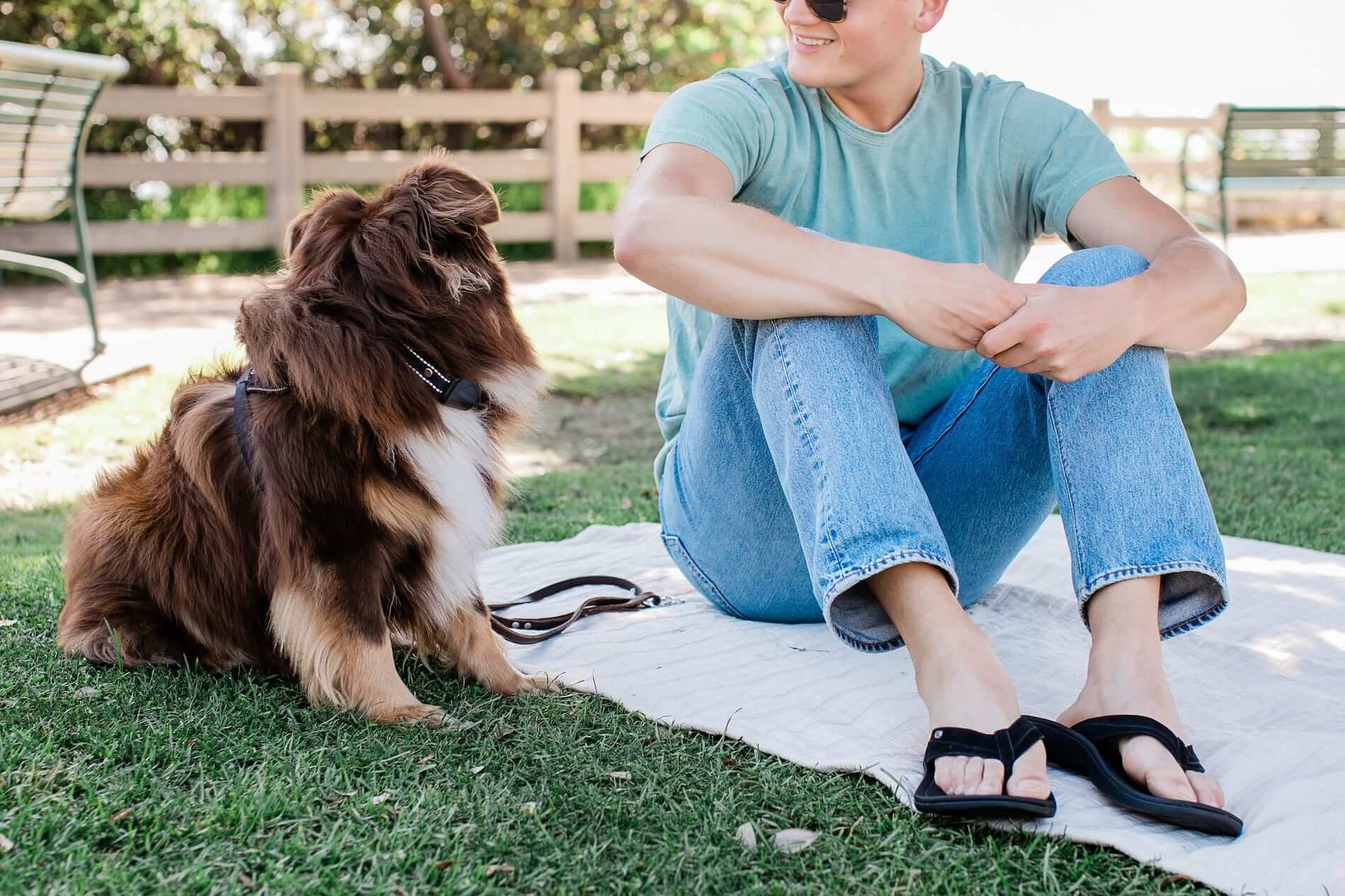 Man sitting outside on grass with dog Harmony 783 Men’s Grounding Conductive Earthing Sandal Cameron Black Nubuck Flip Flop
Lifestyle 3