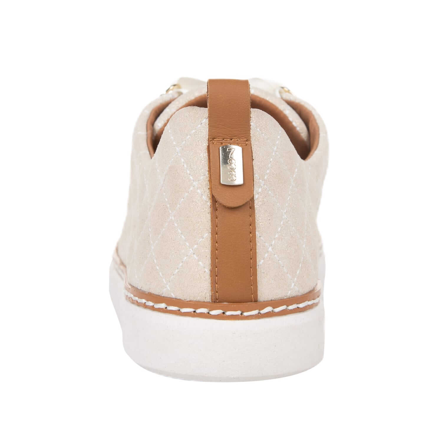 Heel view of gold creme quilted sparkly grounding walking shoe