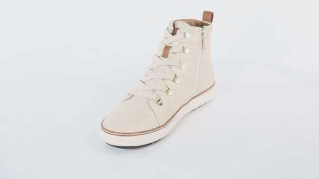 360 video of gold creme quilted grounding high-tops