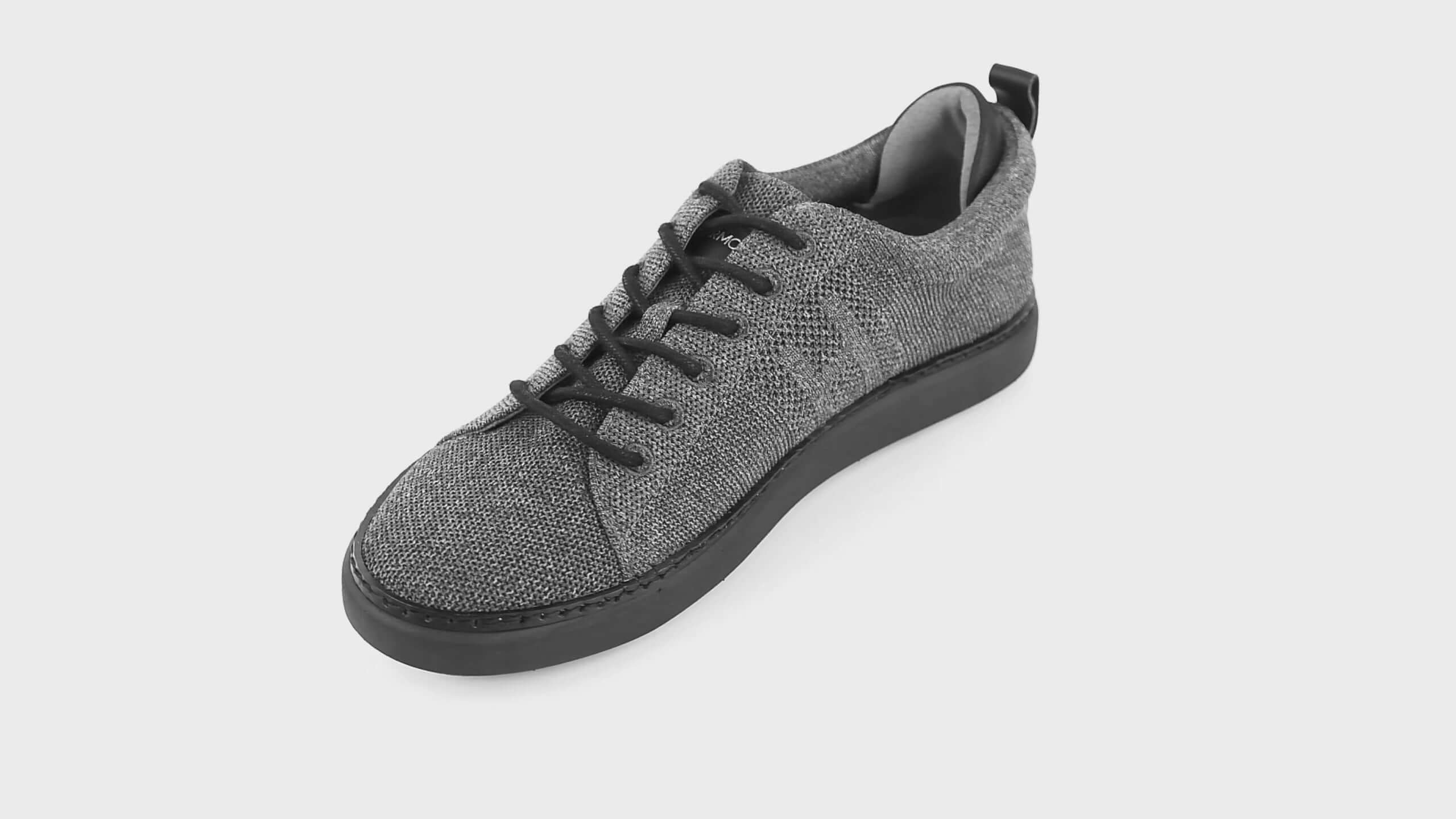 360 view video of charcoal and black knit grounding walkers