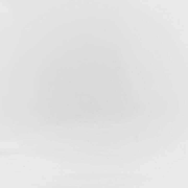 Man walking in shorts with grey bamboo knit grounding slip ons