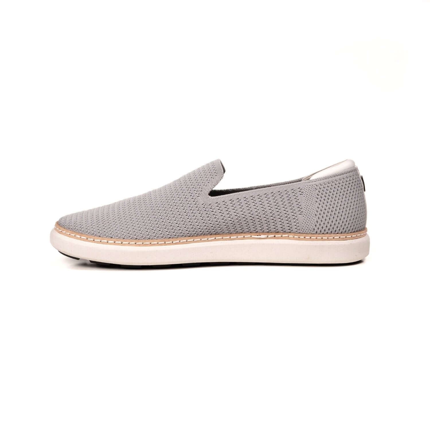 Profile side view of grey bamboo knit grounding slip-ons