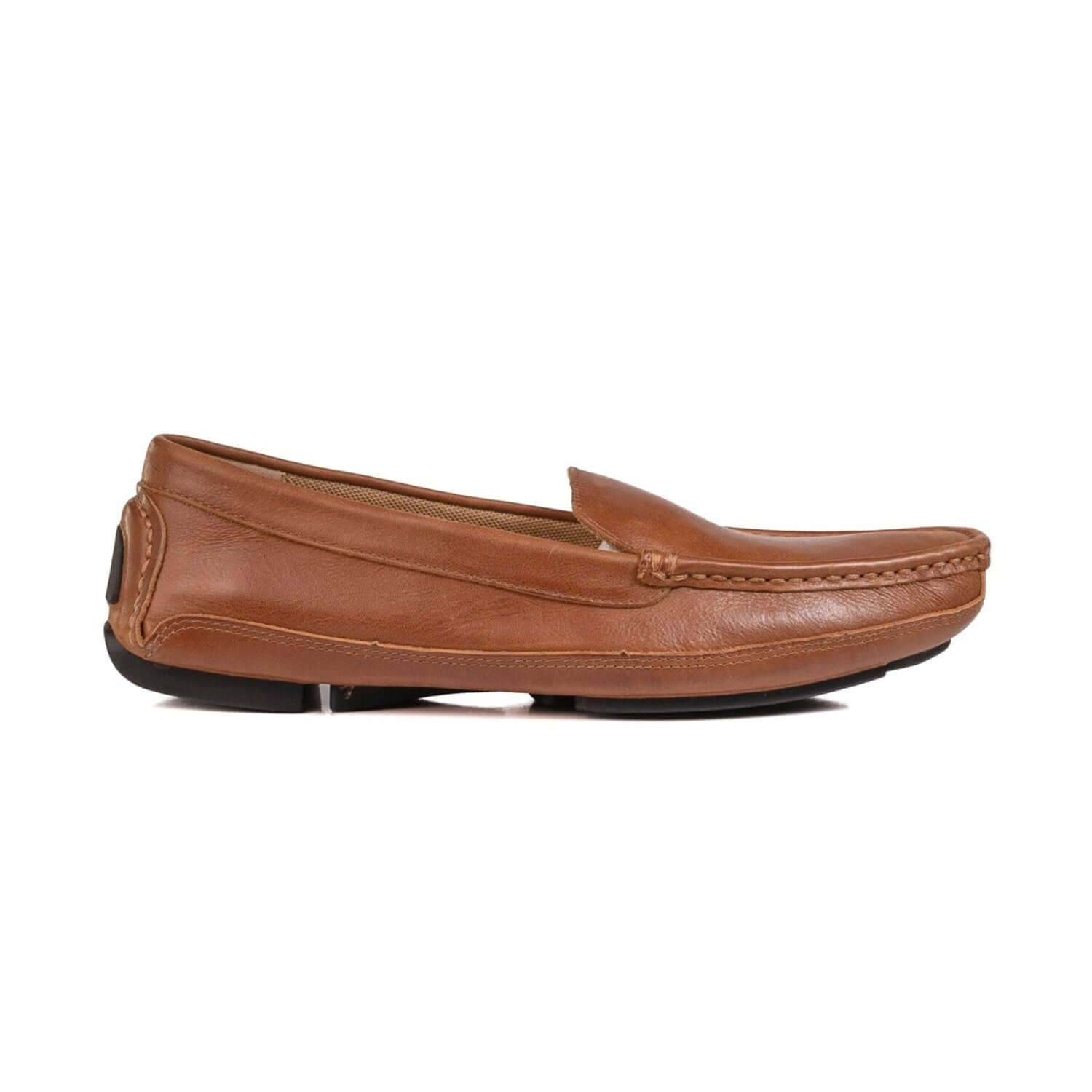 Profile side view of men's brown leather grounding driver