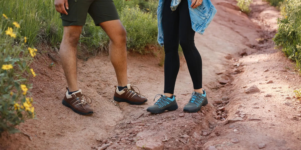 A pair of grounding sandals worn on an outdoor path