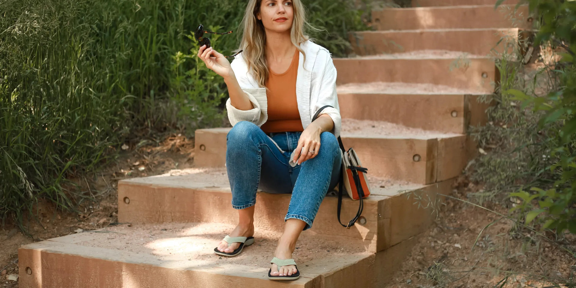 A calm outdoor scene representing earthing for anxiety and nervous system relief