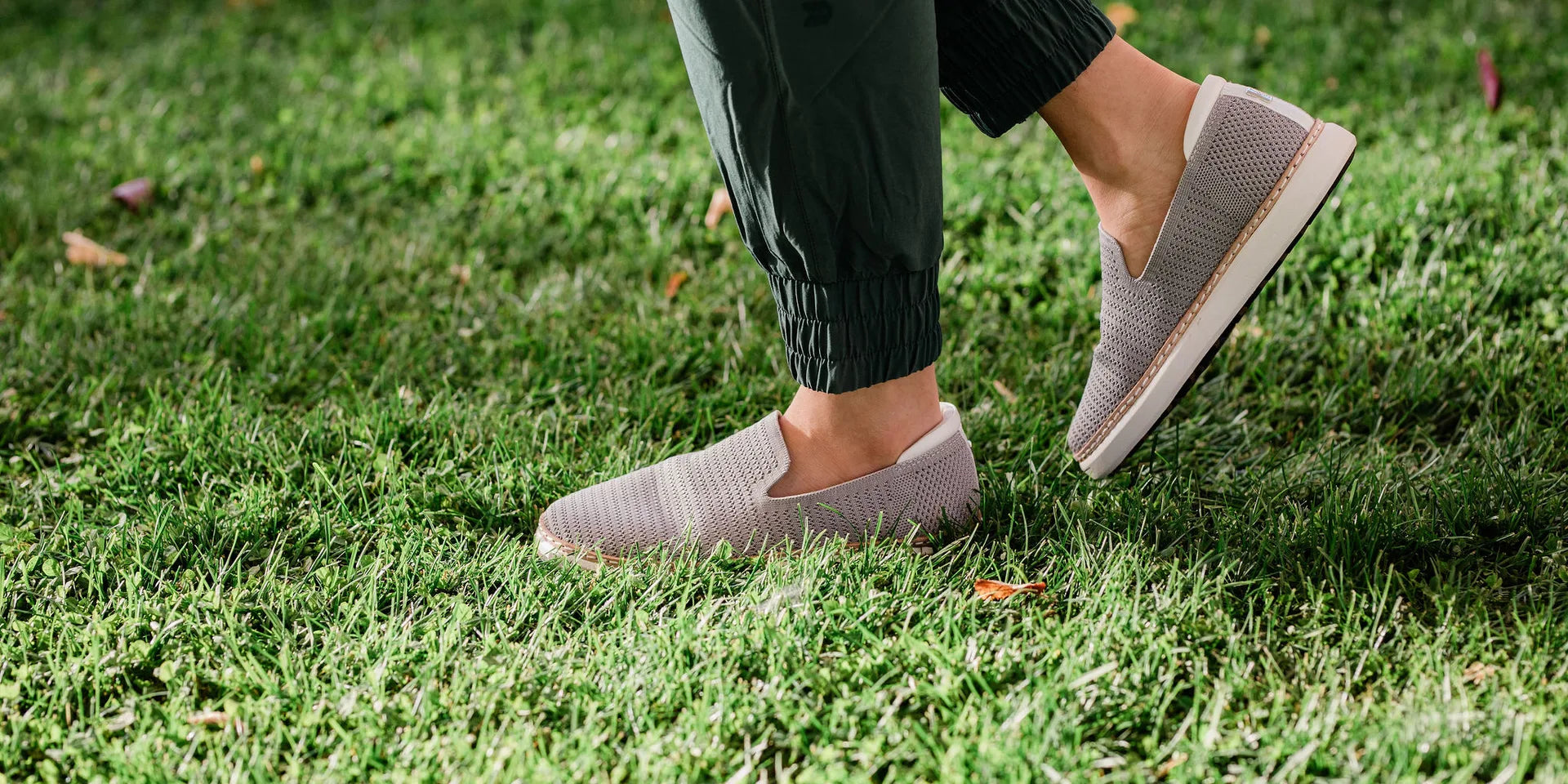 Person grounded outdoors connecting with nature in Harmony 783 grounding footwear
