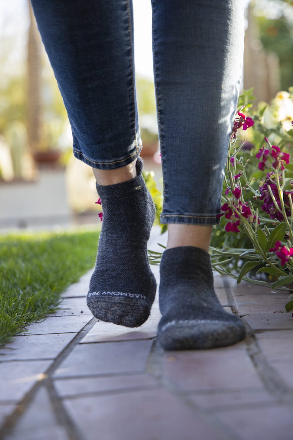 Close up of Walking on brick wearing grey Harmony 783 Low Cut Grounding earthing socks Merino Wool and Silver Stitching
Lifestyle1