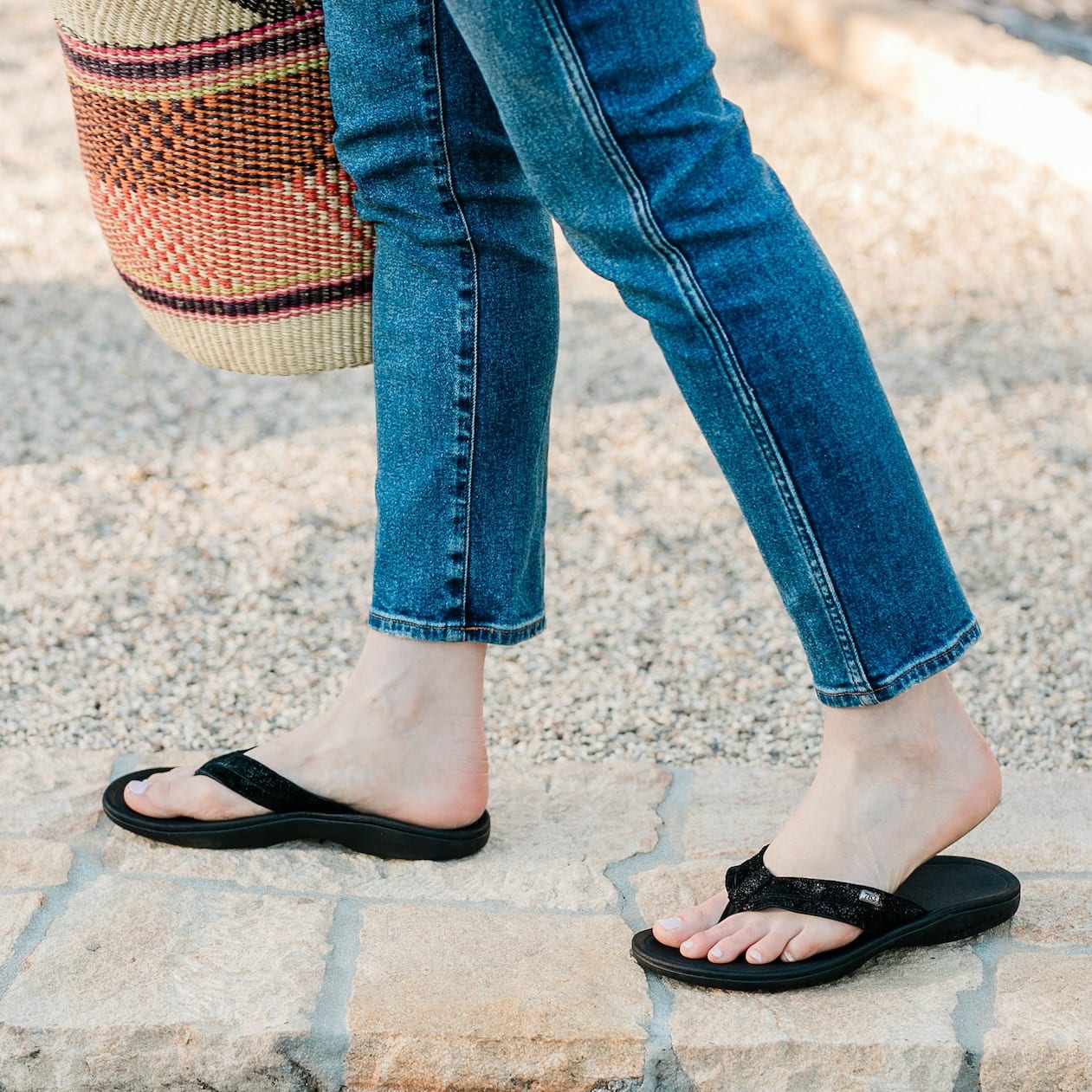 Woman Standing on Stone wearing Harmony 783 Stella Womens Grounding Conductive Earthing Sandal in Black Shimmer Suede Flip Flop
LIfestyle2