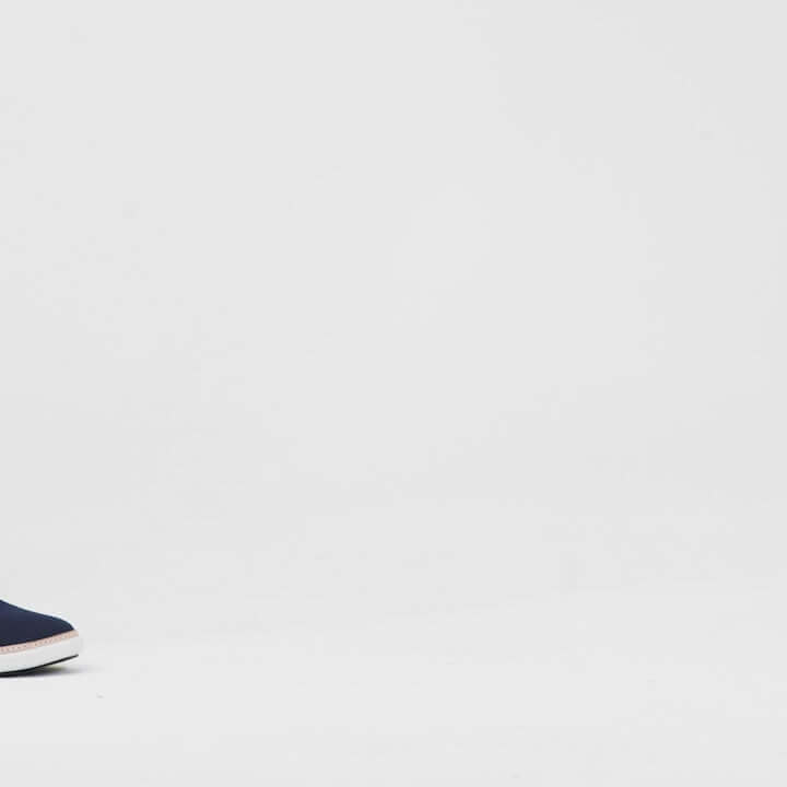 Man walking in Unisex Navy Bamboo Grounding Slip On