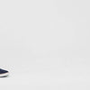 Man walking in Unisex Navy Bamboo Grounding Slip On