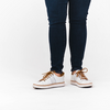white wall walking video of the white leather grounding shoes