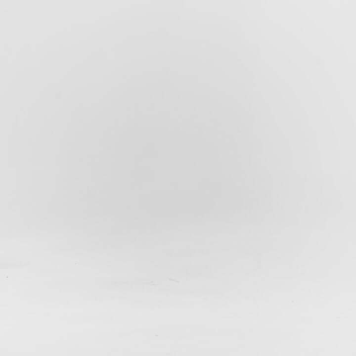 Woman walking in jeans and the black and white grounding bamboo knit slip-on