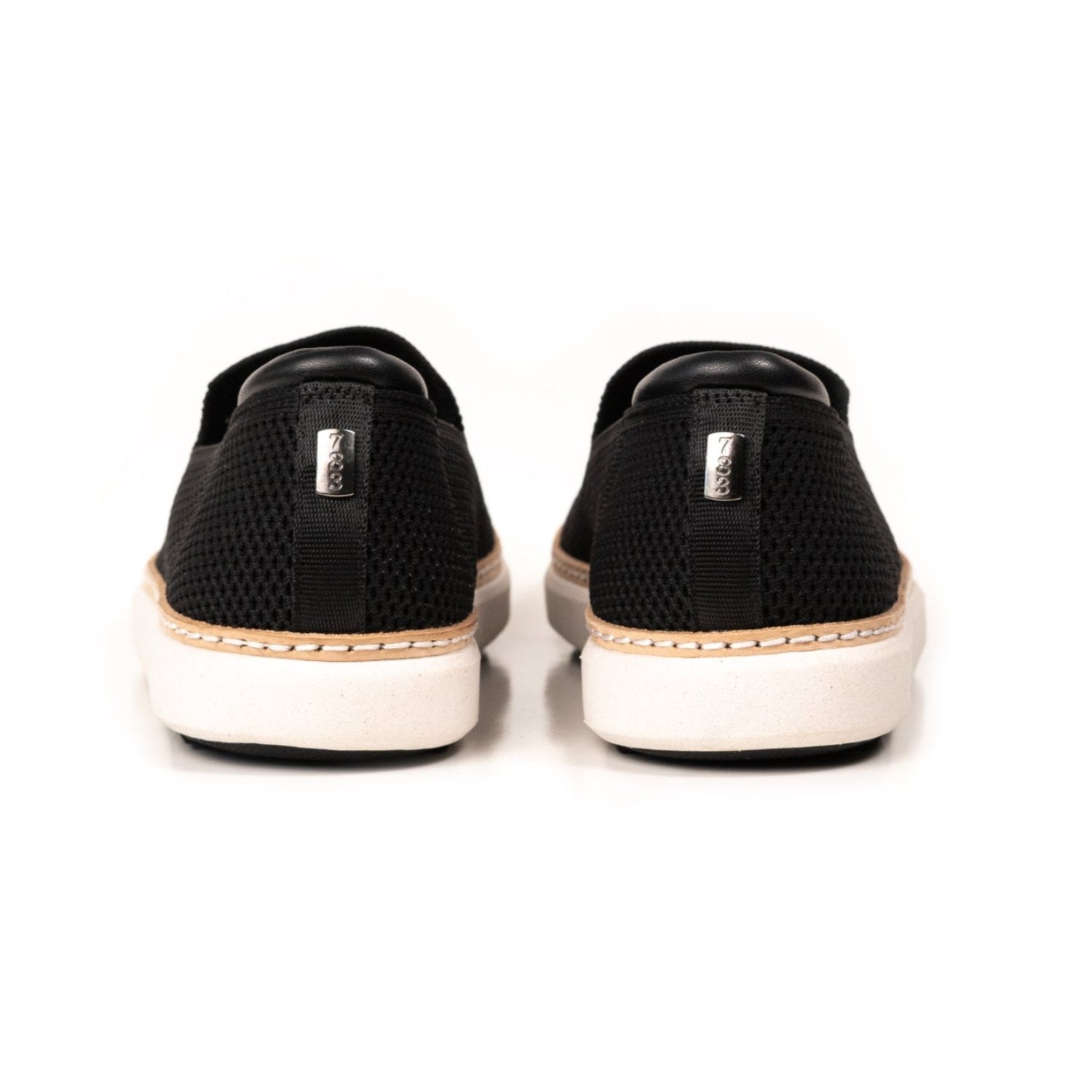 Heel view of the black and white grounding bamboo knit slip-ons